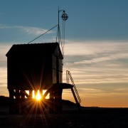 Drenkelingenhuisje bij zonsondergang